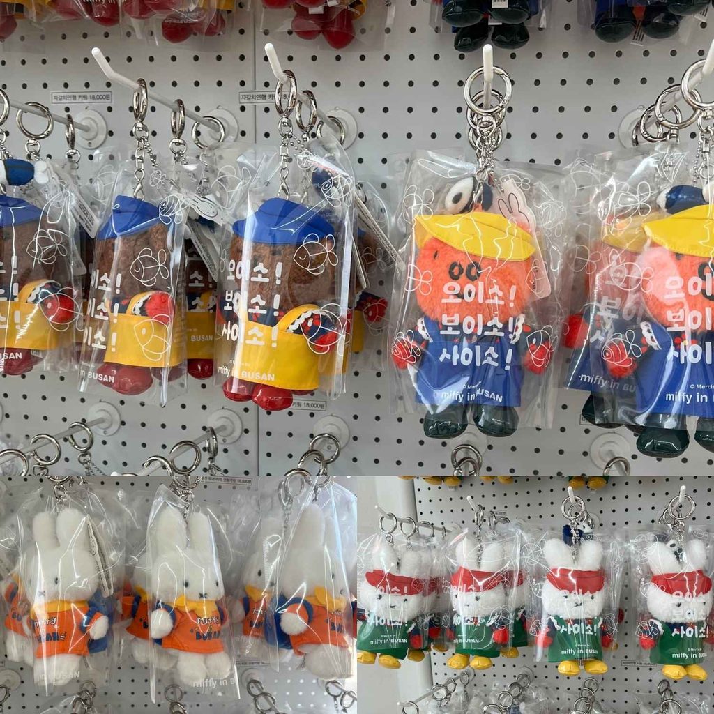 Cute Miffy plush toys and character standees dressed in special sailor and regional outfits on display inside the store in Busan.