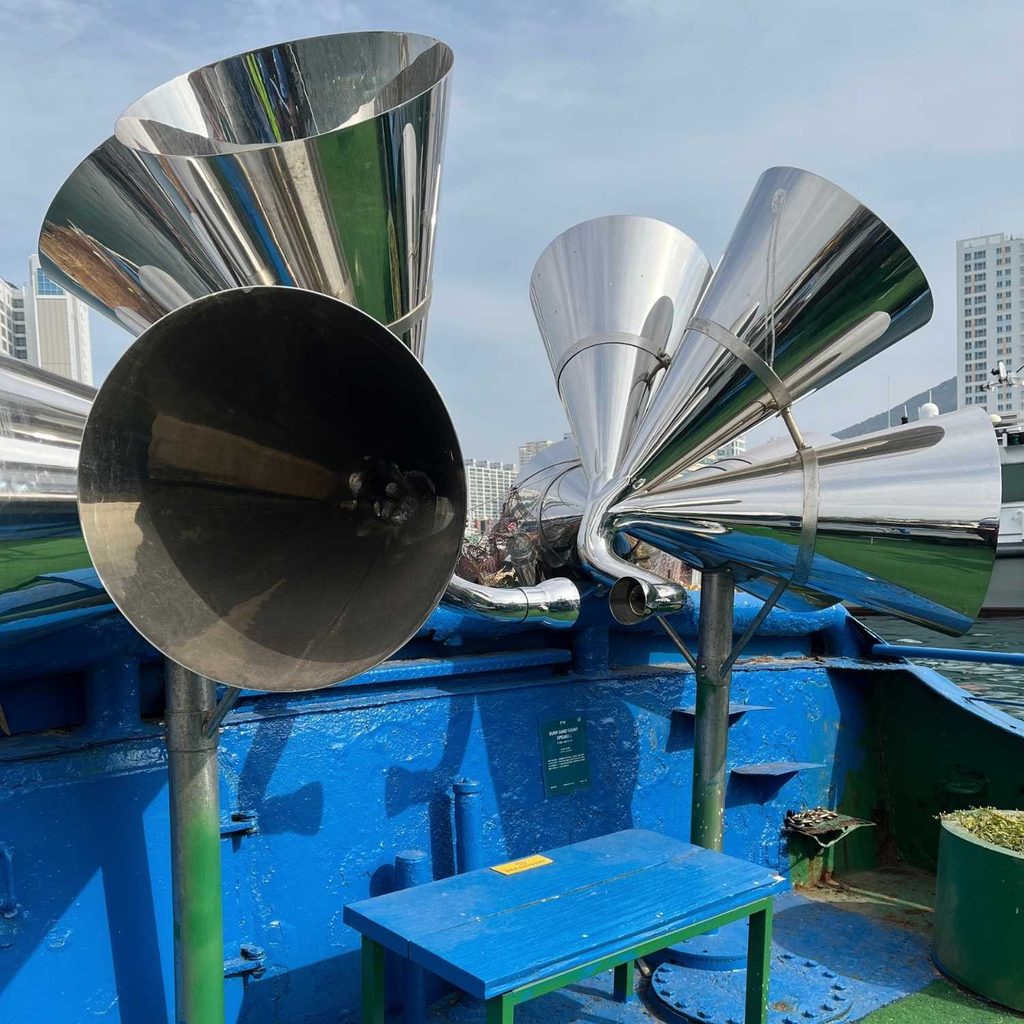 A large decorative ship horn and megaphone art installation at the floating ship experience zone in Kangkangee Art Village.
